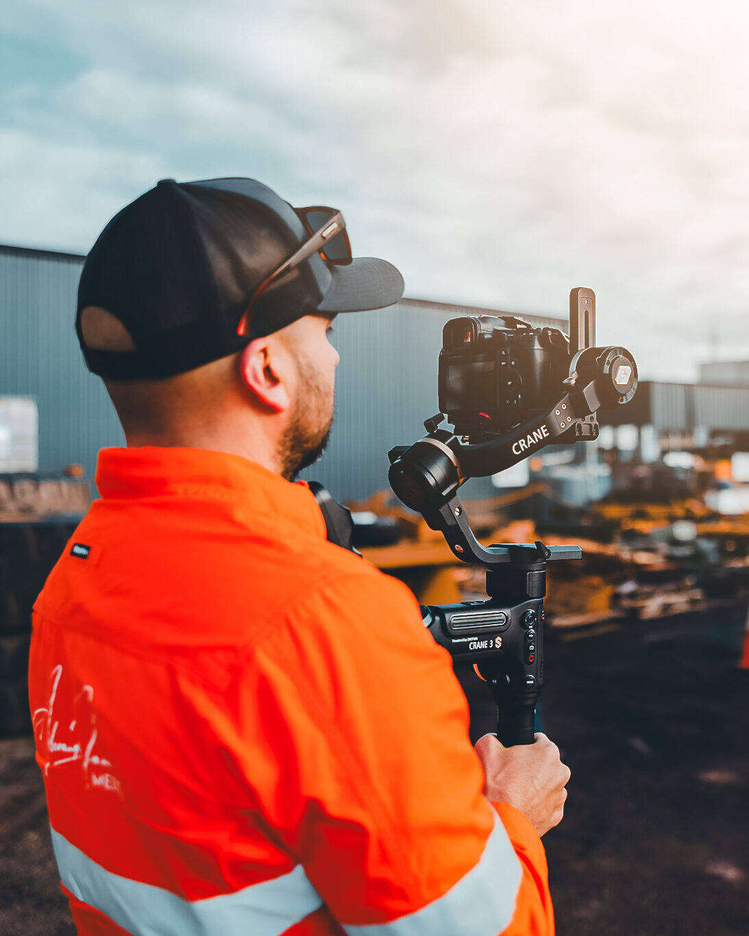 Alex on site, behind the camera on an industrial job